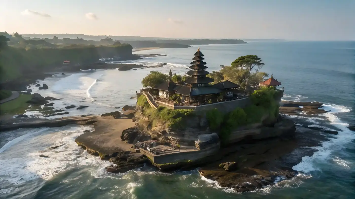 Aerial view of Tanah Lot sea temple at sunset in Bali