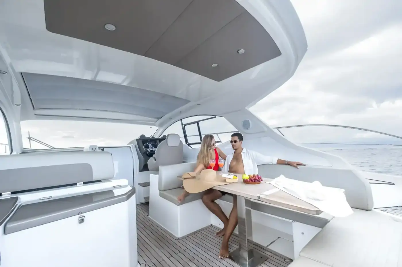 Guests relaxing on the deck of a private yacht charter in Bali