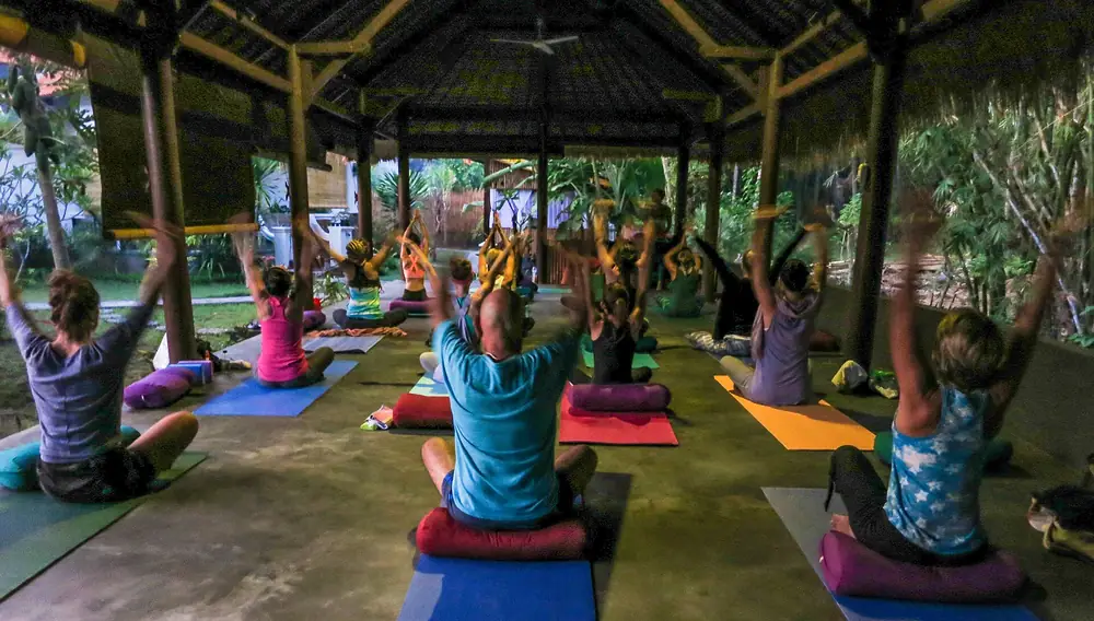 Yoga class in an open pavilion in Amed, Bali