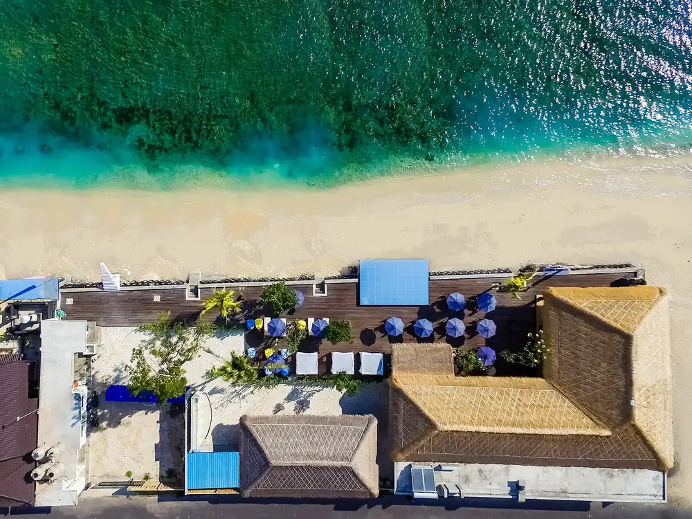 Aerial view of a beach club on the Bali coast