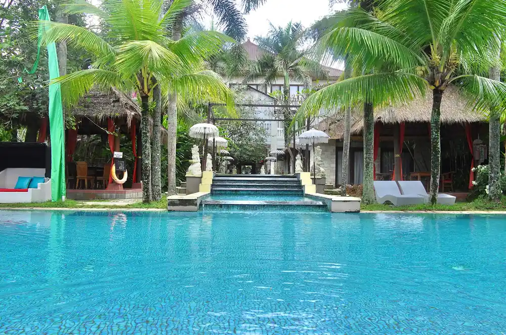 Pool and gardens of a spa resort in Ubud