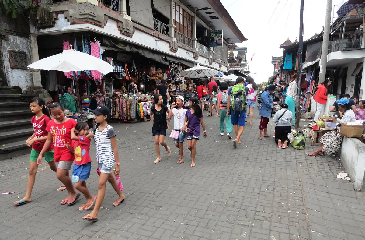 Shoppers on the street outside Ubud Market
