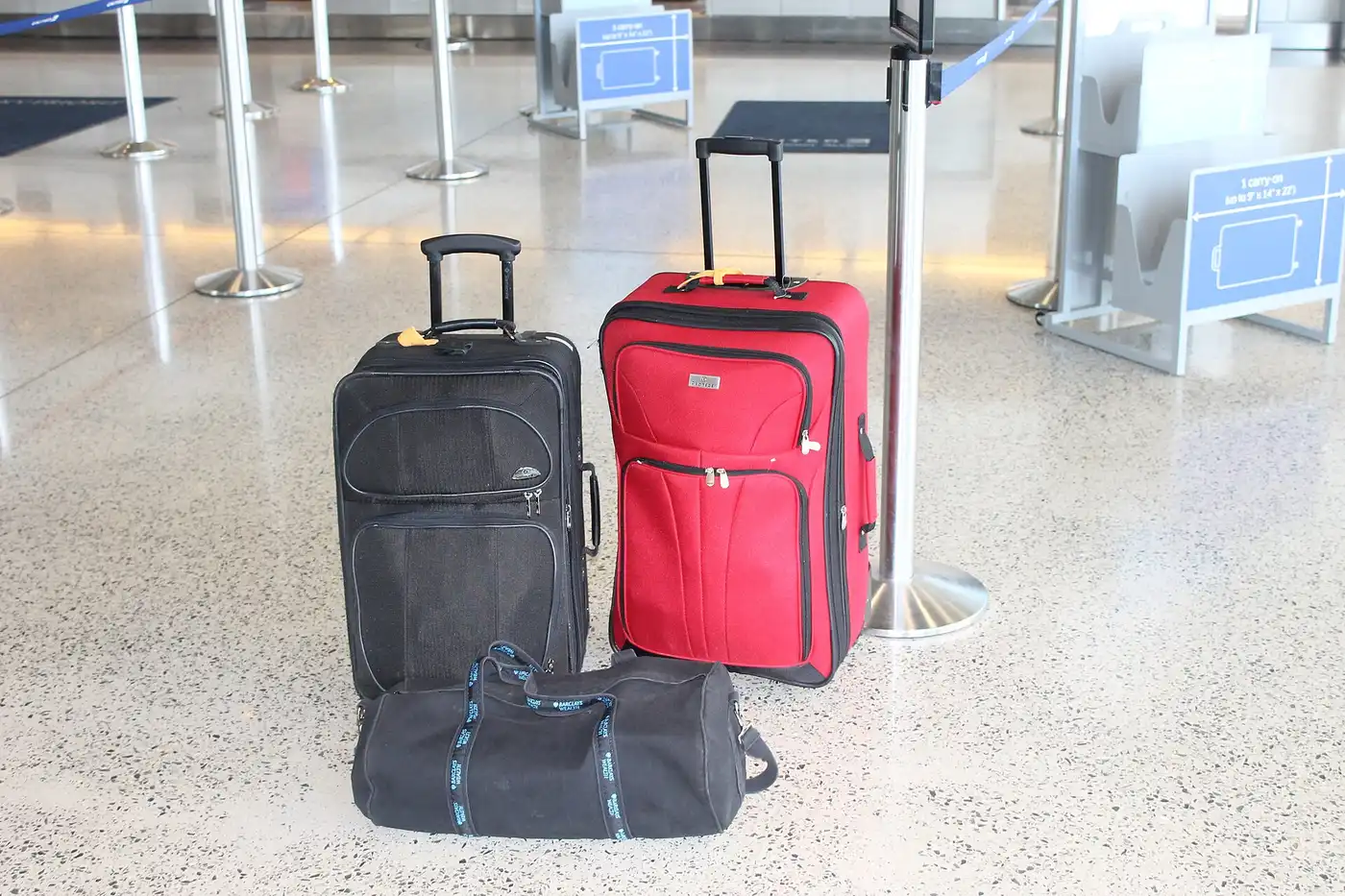 Suitcases packed and ready in an airport terminal