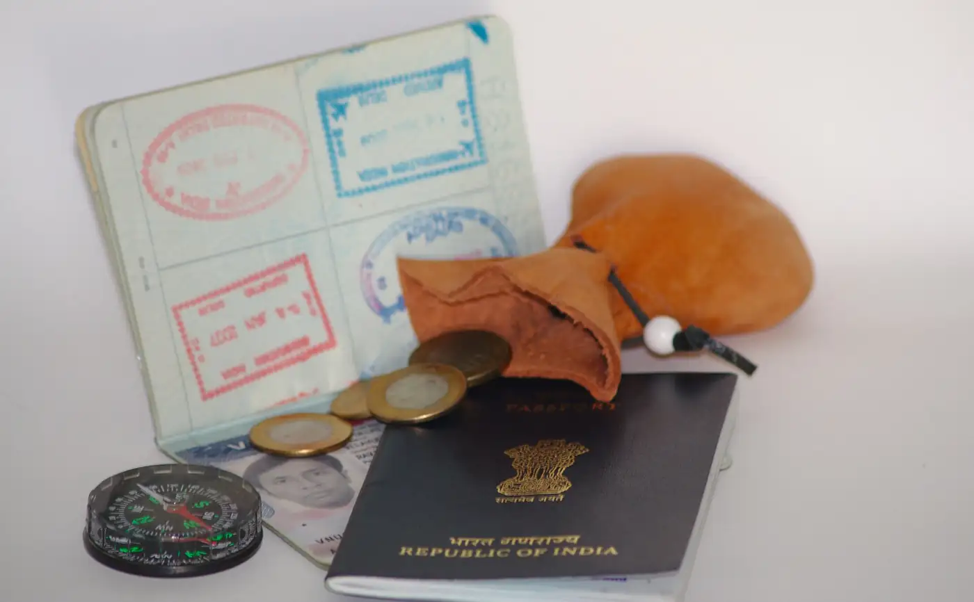 Passport, coins and travel documents prepared before a trip